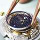 Illustration for article titled This Planetarium Watch is Elegant, Impressive, and Expensive